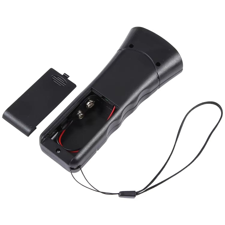Ultrasonic barking device with battery compartment open and cover removed, showing internal battery connections