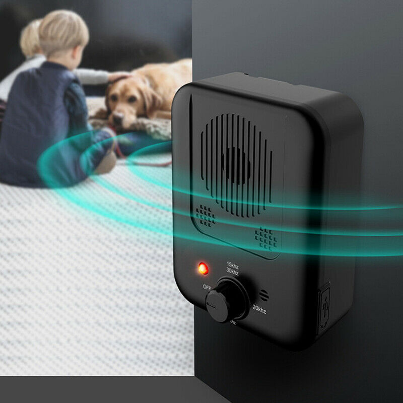 Black Dog Bark Silencer mounted on wall emitting teal ultrasonic waves