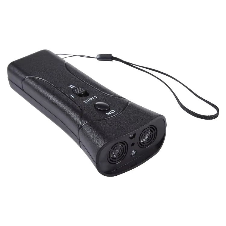 Black handheld ultrasonic barking device angled view showing dual emitters, ON button, light switch and wrist strap