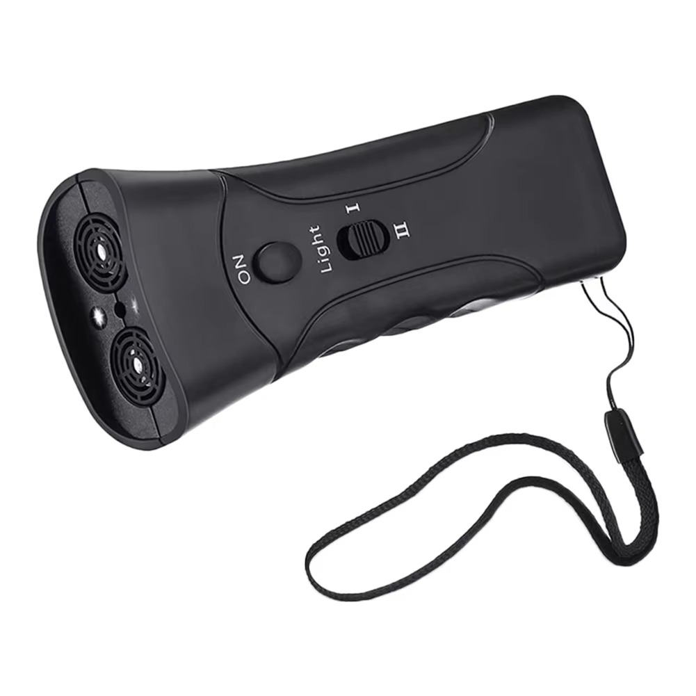 Black ultrasonic barking device angled side view showing dual emitters, controls and black wrist strap on white background